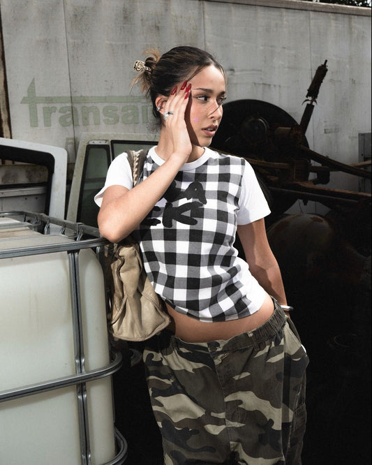 BLACK COMME DES GARÇONS GINGHAM CHECK TEE - VESSEL, racing forward